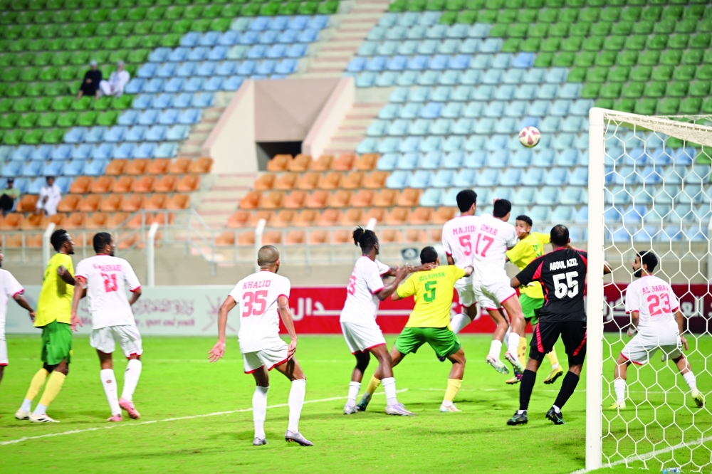 Oman Club players in action during the 1-0 win over Al Khabourah in Round 18. — Khalfan al Ruzaiqi