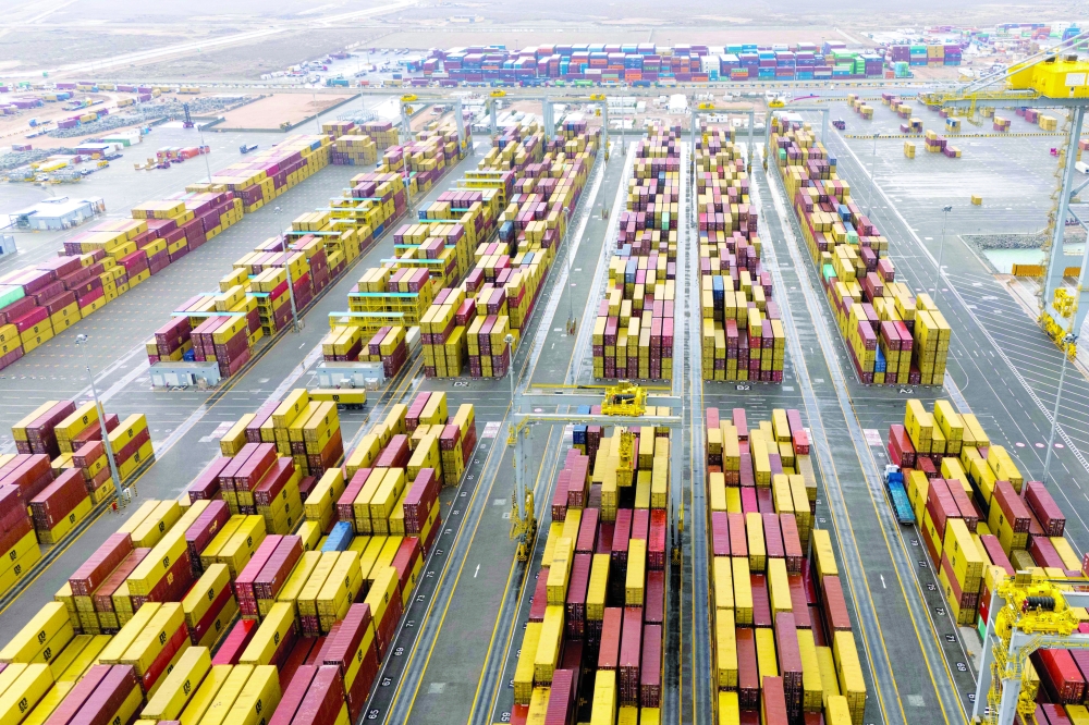 This aerial photo shows stacked shipping containers at Umm Qasr Port in Basra. — AFP