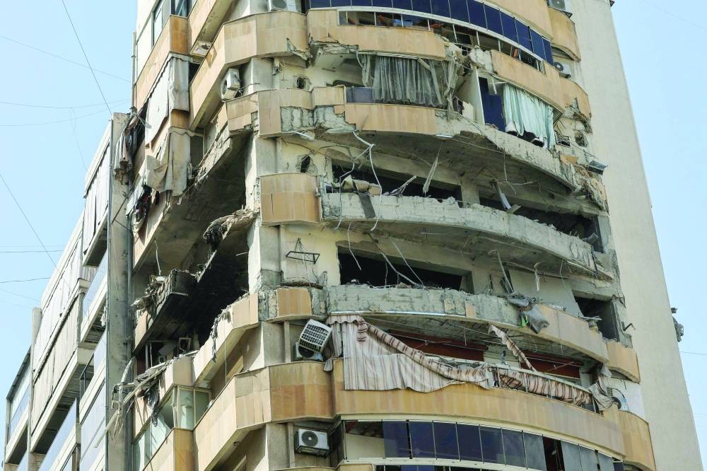 A photograph shows the damage in the aftermath of an Israeli air strike, in central Beirut's Zuqaq al-Blat neighbourhood. — AFP