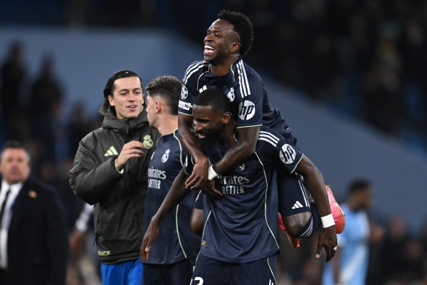 Vinicius Jr nets double as Real Madrid dispatch Man City in Champions League last 16