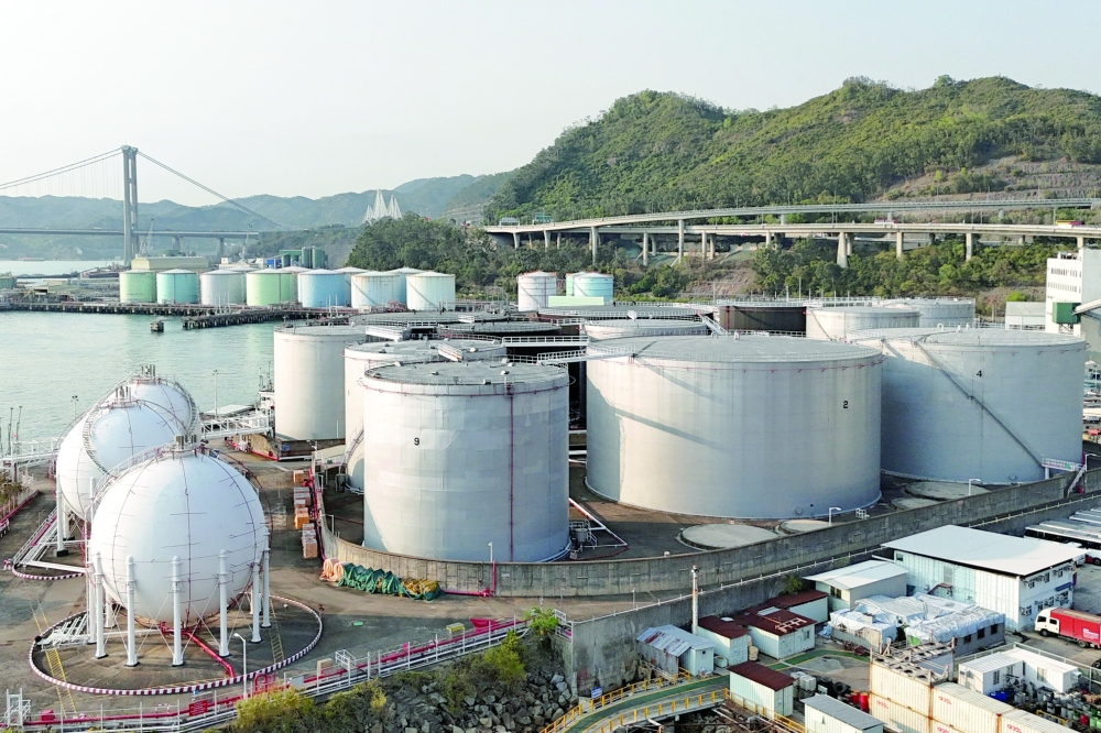 A drone view shows oil storage tanks at a depot at Tsing Yi port in Hong Kong. — Reuters