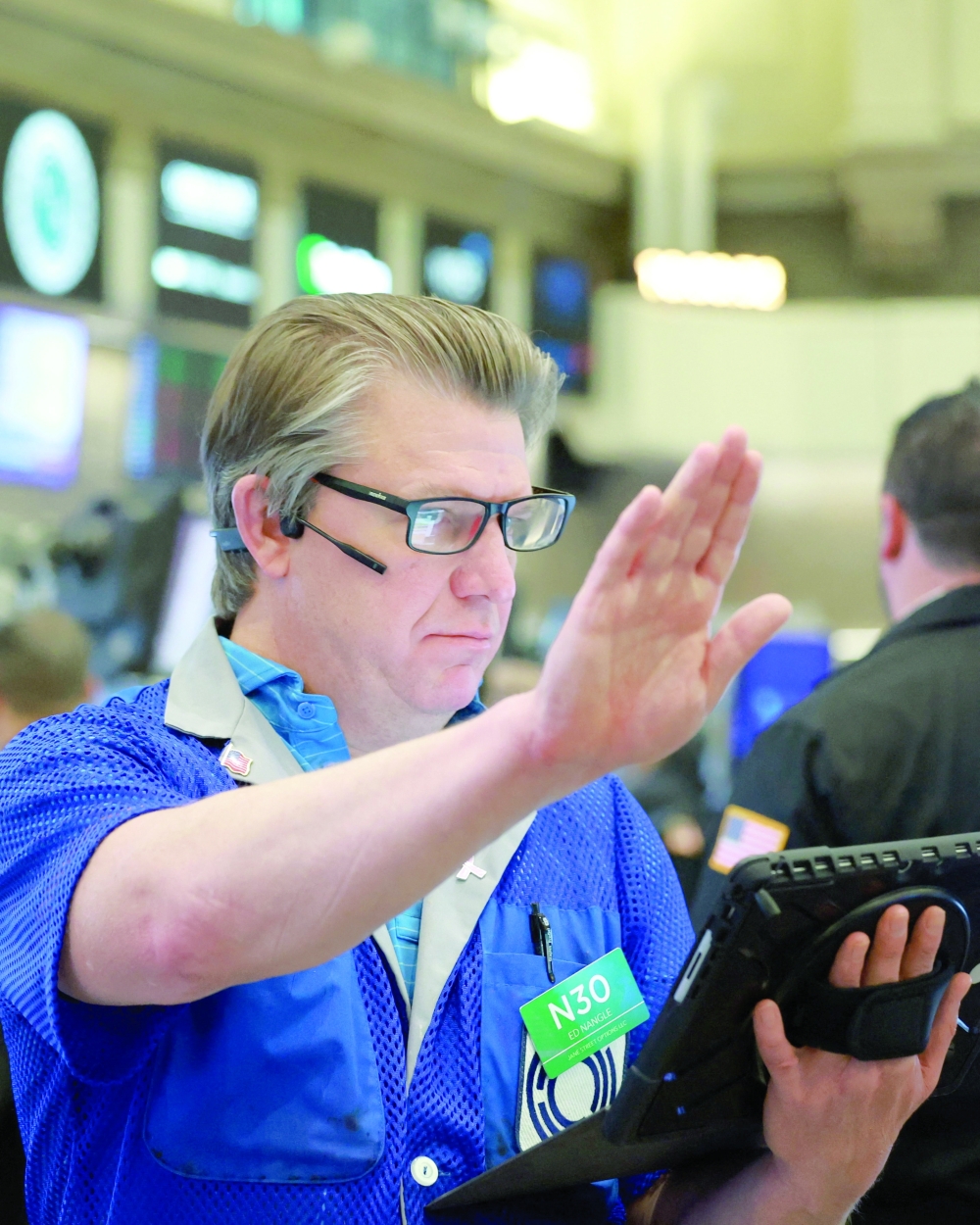 A futures-options trader works on the floor at the New York Stock Exchange's NYSE American (AMEX) in New York. — Reuters