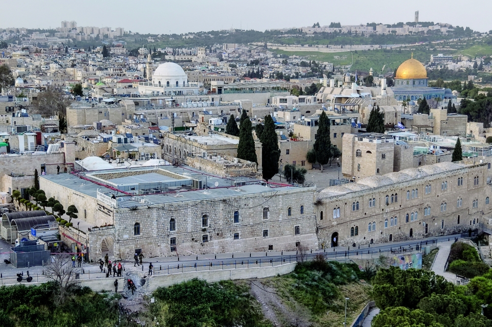 A drone photo of emergency services inspect the damage in Jerusalem's Old City after Iran launched missiles towards Jerusalem, amid the US-Israel conflict with Iran. - Reuters 