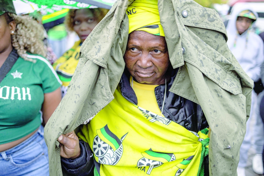 A supporter during the 'People’s March,' led by the African National Congress in defence of the country’s sovereignty and democratic gains in Johannesburg. — AFP