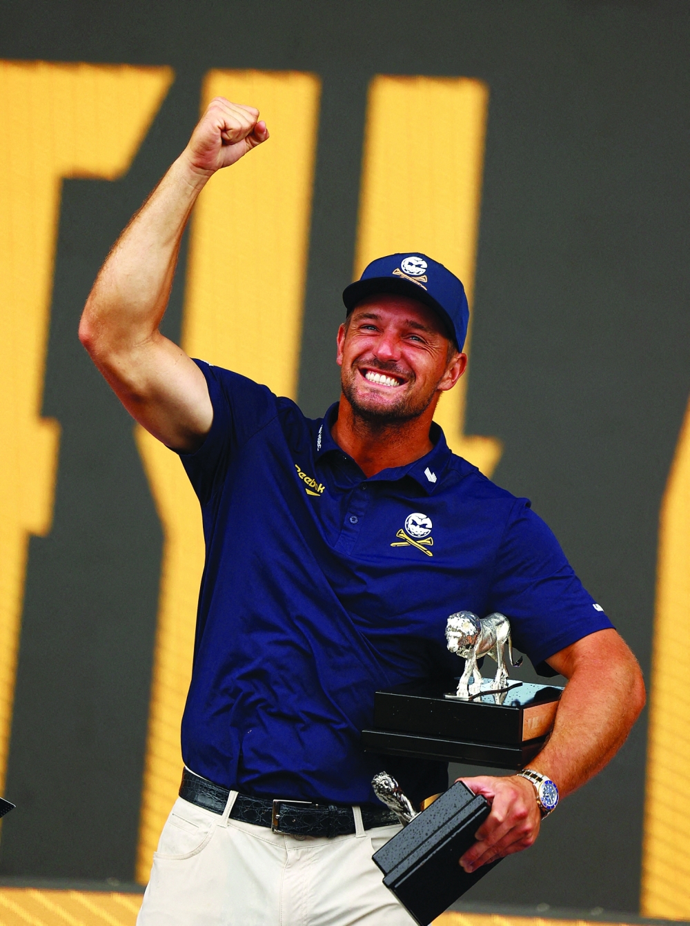 Crushers GC's Bryson DeChambeau celebrates with his trophies after winning the LIV Golf South Africa individual and team events. — Reuters