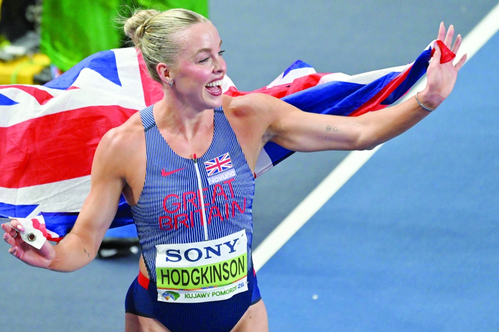 Britain's Keely Hodgkinson celebrates after winning the women's final 800 metres event during the World Athletics Indoor Championships Kujawy Pomorze 2026 in Torun, Poland. — AFP
