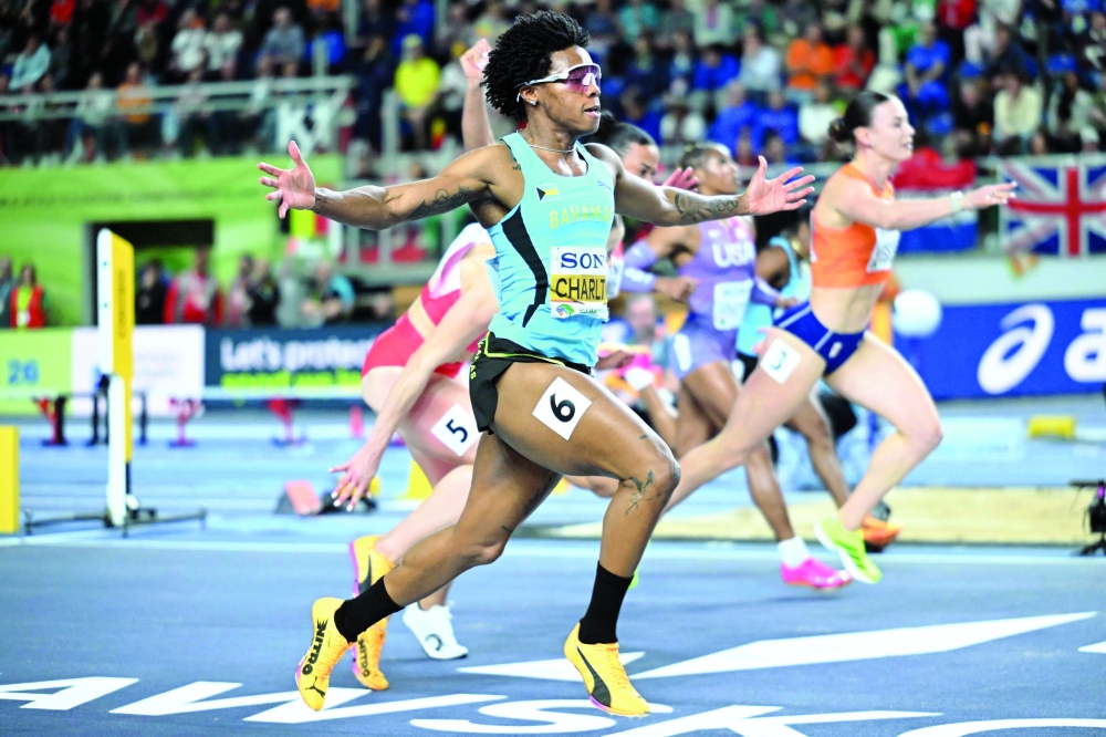 Bahamas' Devynne Charlton wins the women's final 60 metres hurdles event. — AFP

