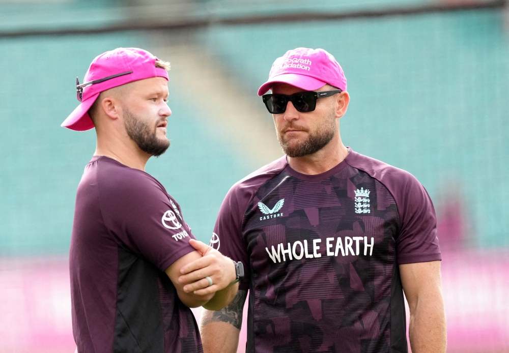 England head coach Brendon McCullum and Ben Duckett during the warm up  