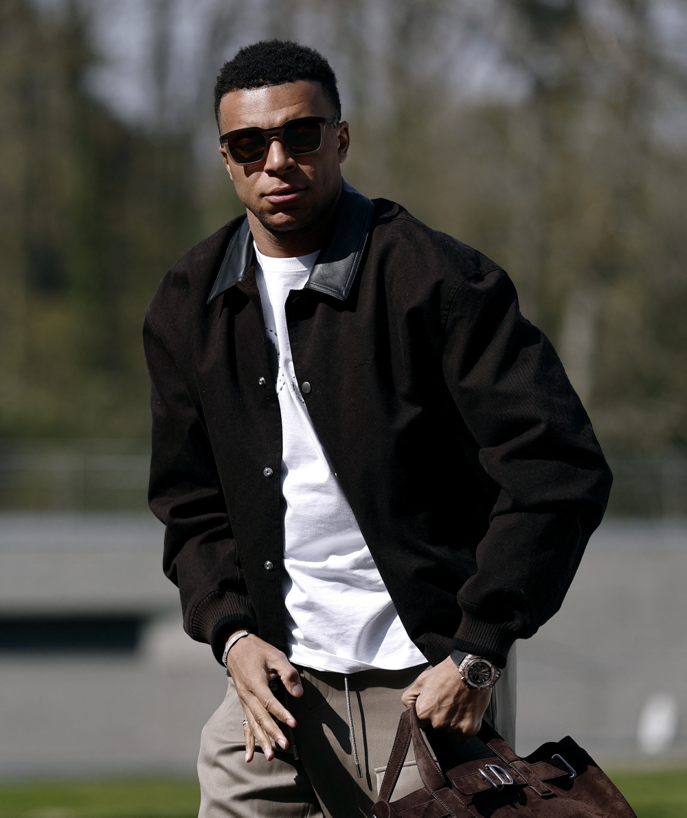  France's Kylian Mbappe arrives before training 