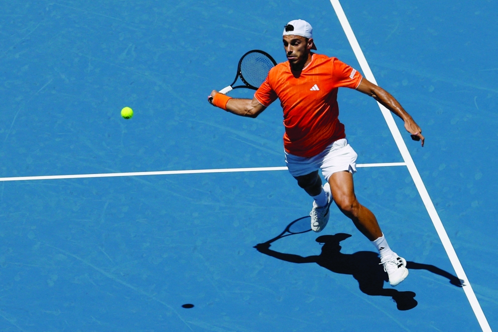 Francisco Cerundolo (ARG) hits a forehand against Daniil Medvedev (not pictured) on day 7 of the 2026 Miami Open at Hard Rock Stadium. —Imagn Images