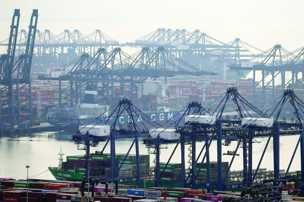 Cranes and cargo ships at a terminal of the Yantian port in Shenzhen, Guangdong province, China. — Reuters