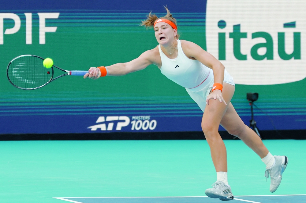 Karolina Muchova (CZE) reaches for a forehand against Victoria Mboko (CAN) on day eight of the 2026 Miami Open at Hard Rock Stadium. — Imagn Images