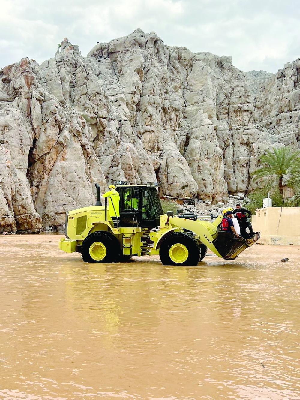 People stuck in rain waters are being rescued.