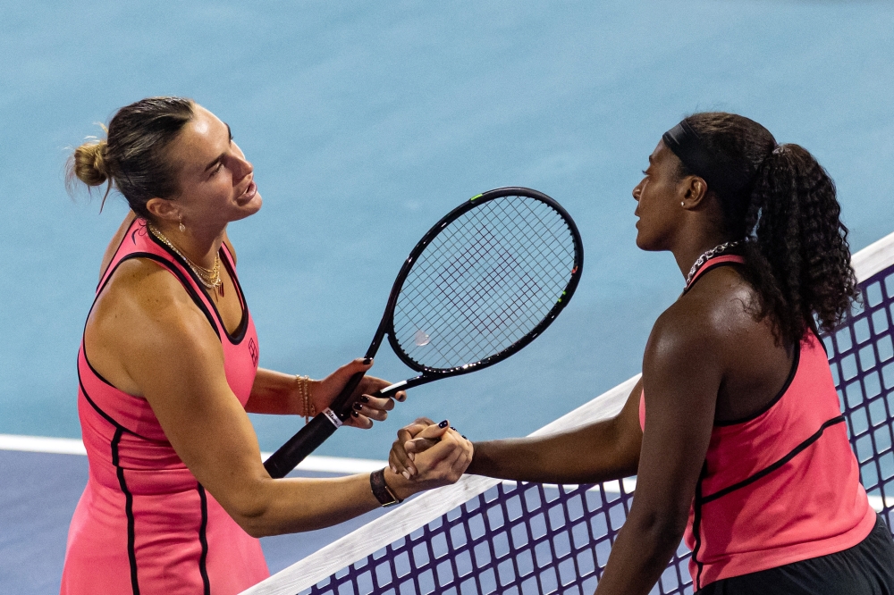 Aryna Sabalenka of Belarus shakes hands after defeating Hailey Baptiste of the United States in the quarter finals 