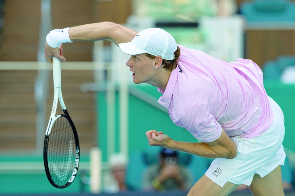 Jannik Sinner of Italy hits a shot against Frances Tiafoe of the United States in the quarterfinal of the Miami ATP Open at Hard Rock Stadium. — Imagn Images