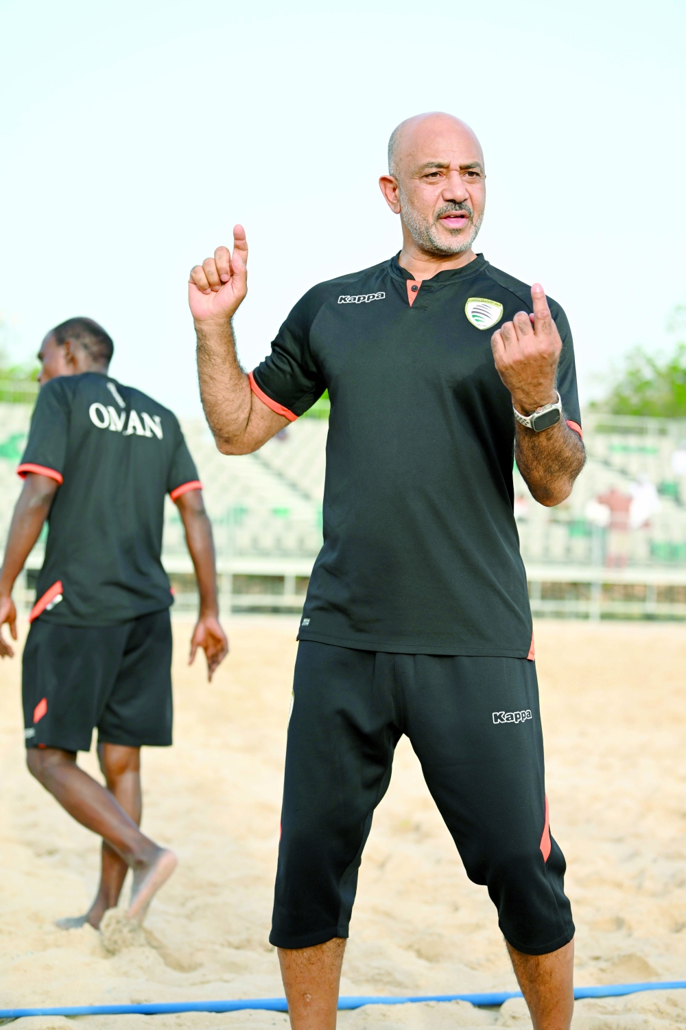 Oman coach Talib al Thanawi gives instructions during the match. — Abdulwahid al Hamadani
