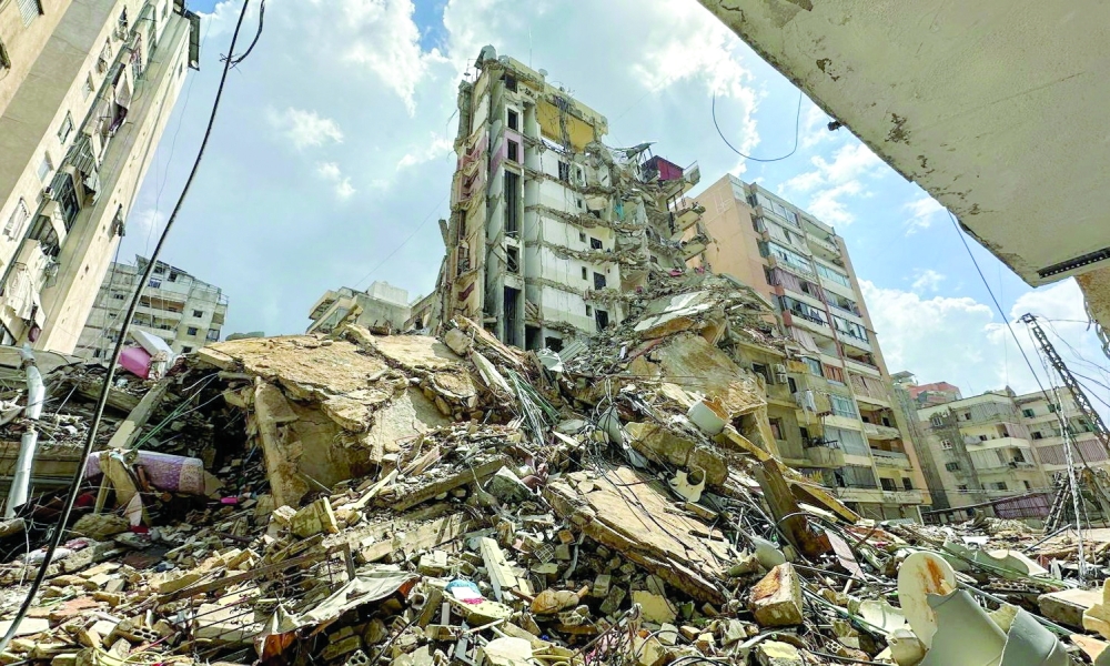 Debris in front of buildings damaged by Israeli strikes in Beirut's southern suburbs, Lebanon. — Reuters