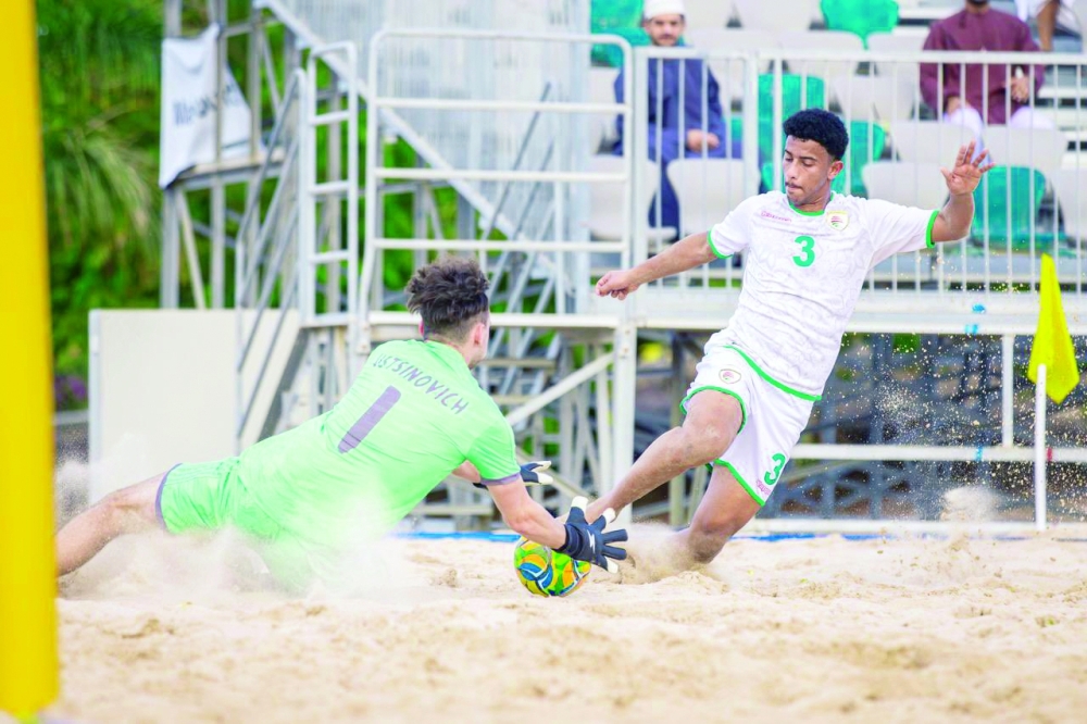 The goalkeeper's attempt to save the ball.