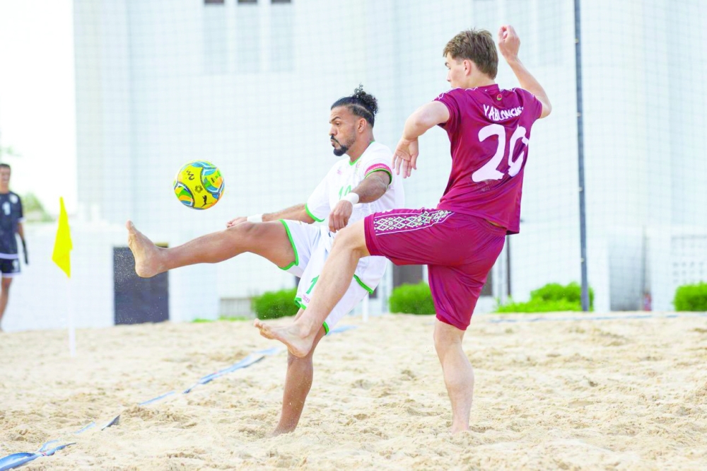 The defender attempts to intercept, while the attacker tries to dribble past him to take the ball over the defender.