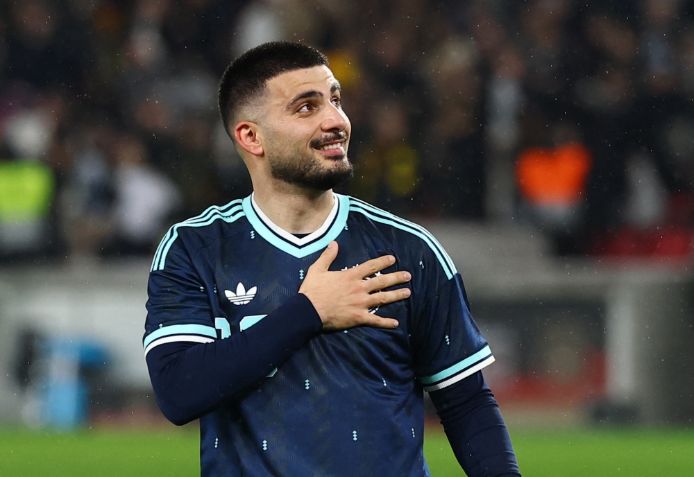 Germany's Deniz Undav celebrates after the match 