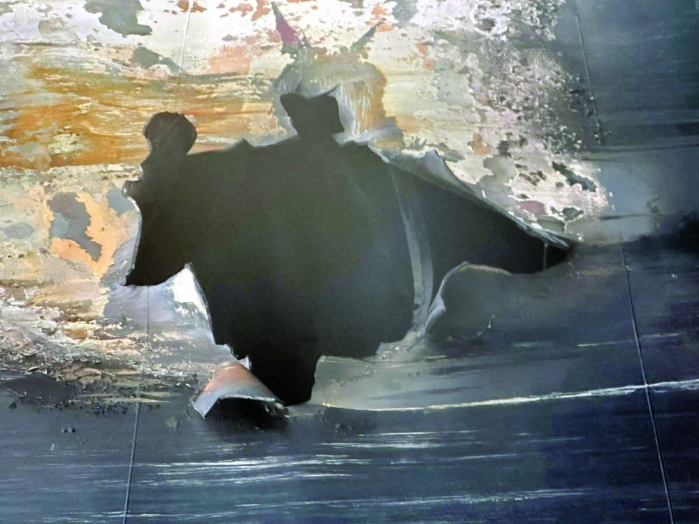 Damage to the Kuwait-flagged Al Salmi crude oil tanker, following a reported strike on Tuesday. — Reuters