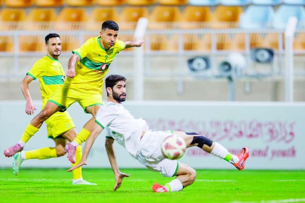 Sohar and Seeb players fight for the ball at the Seeb Stadium.