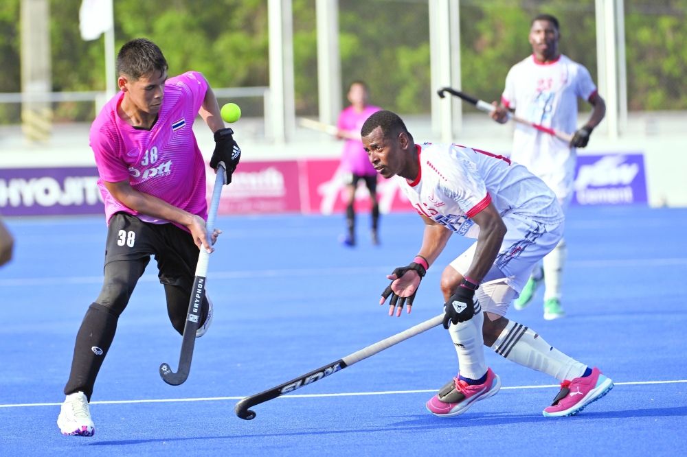 A tightly contested duel for the ball during Oman’s victory over Thailand in the Asian qualifier.
