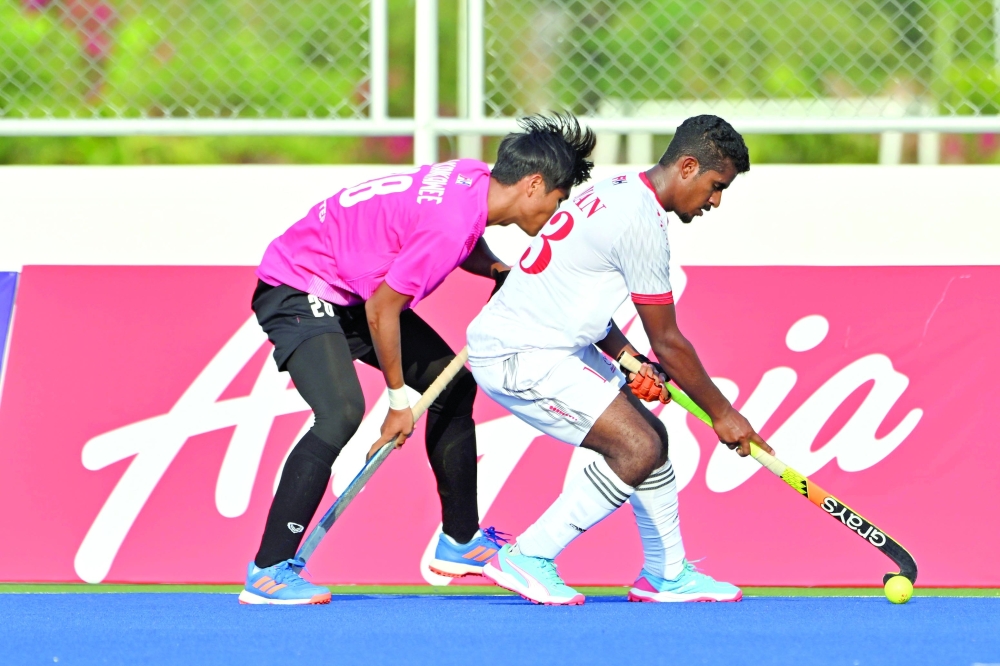 Oman players battle for possession during their 2-1 win over Thailand in the Men’s Asian Games Qualifier 2026 in Bangkok.