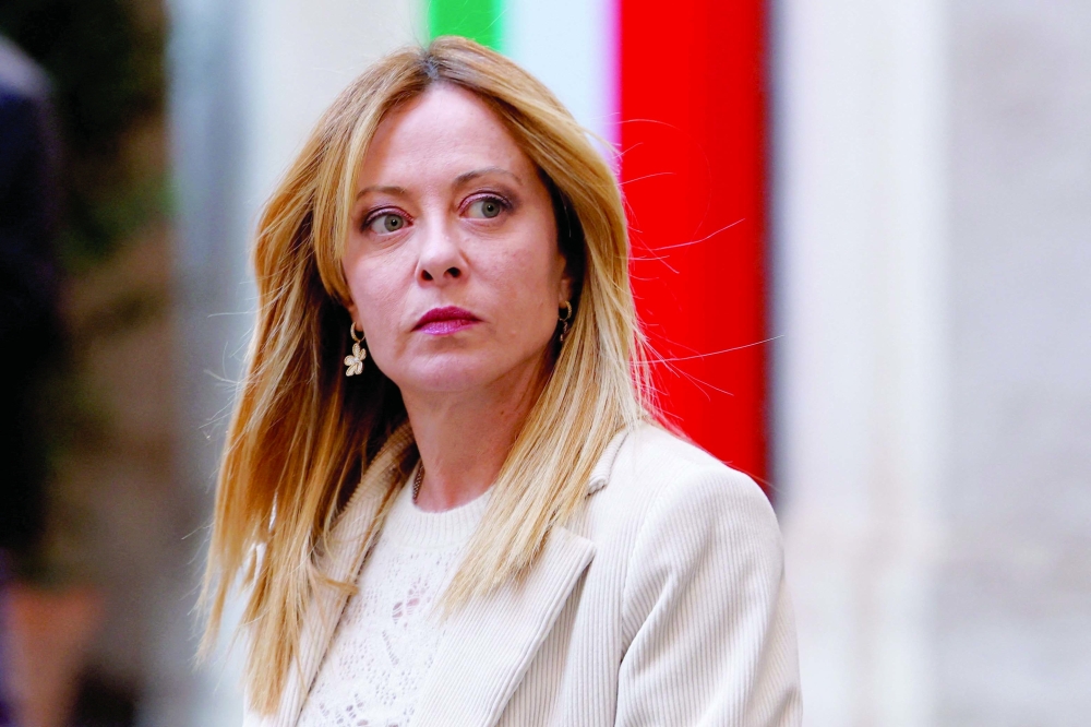 FILE PHOTO: Italian Prime Minister Giorgia Meloni looks on as she waits for the arrival of President of Cyprus Nikos Christodoulides, at Chigi Palace, in Rome, Italy, February 26, 2026. REUTERS/Remo Casilli/File Photo