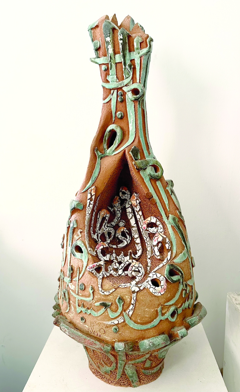 Marwan's artistic style is marked by a seamless blend of authenticity and modernity