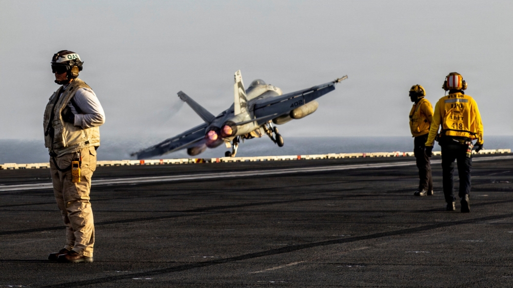An F/A-18E Super Hornet launches from the flight deck of the U.S. Navy Nimitz-class aircraft carrier USS Abraham Lincoln 