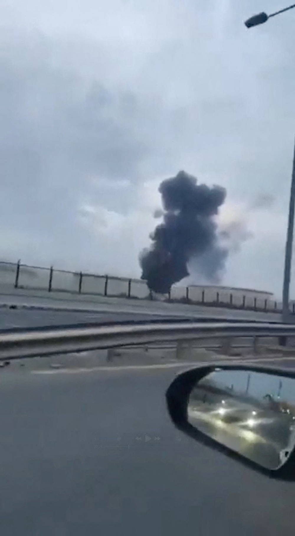Smoke rises from a Bapco facility on Sitra Island in Bahrain