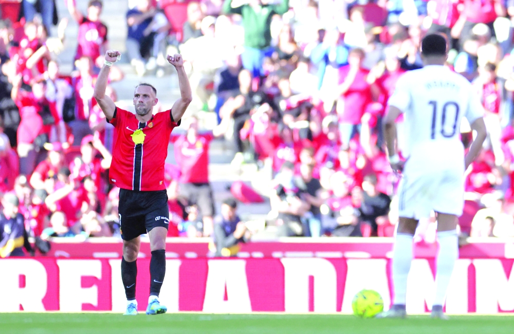 RCD Mallorca's Vedat Muriqi celebrates scoring their second goal. — Reuters