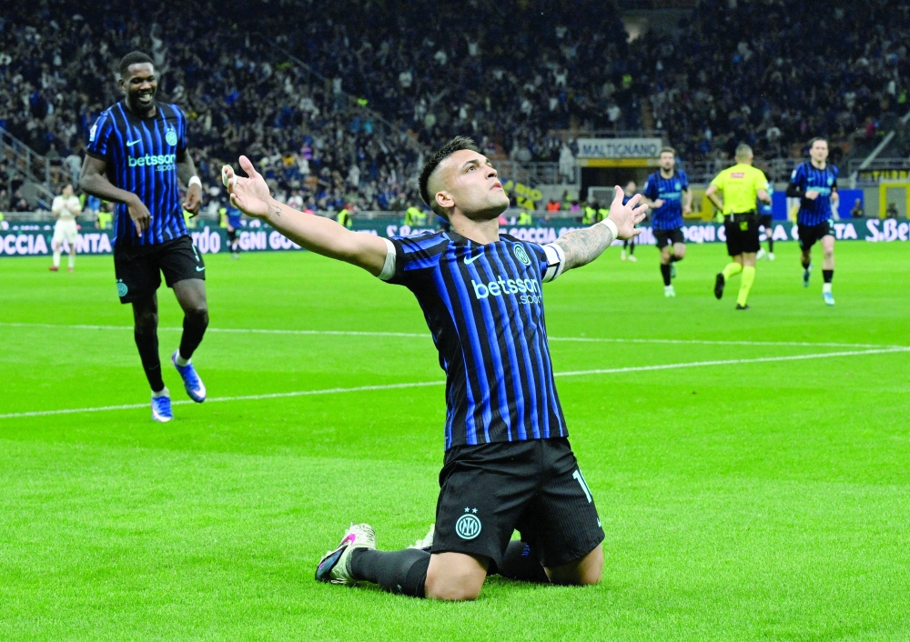 Inter Milan's Lautaro Martinez celebrates scoring their third goal against AS Roma at San Siro, Milan, Italy. — Reuters