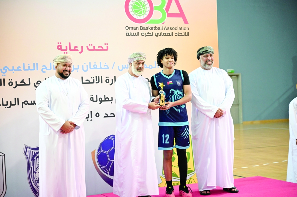 Qaisar al Balushi of Salalah receives the best playmaker award. — Khalfan al Ruzaiqi