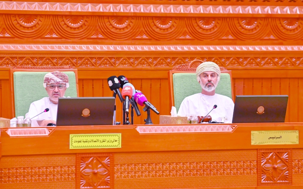 Eng Said bin Hamoud al Maawali, Minister of Transport, Communications and Information Technology, with Khalid bin Hilal al Maawali, Chairman of Majlis Ash’shura, during the session in Muscat on Tuesday.