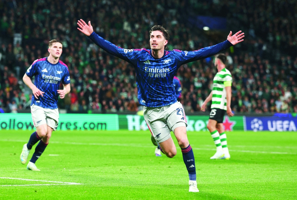 Arsenal's Kai Havertz celebrates scoring their first goal against Sporting Lisbon in Lisbon, Portugal. — Reuters