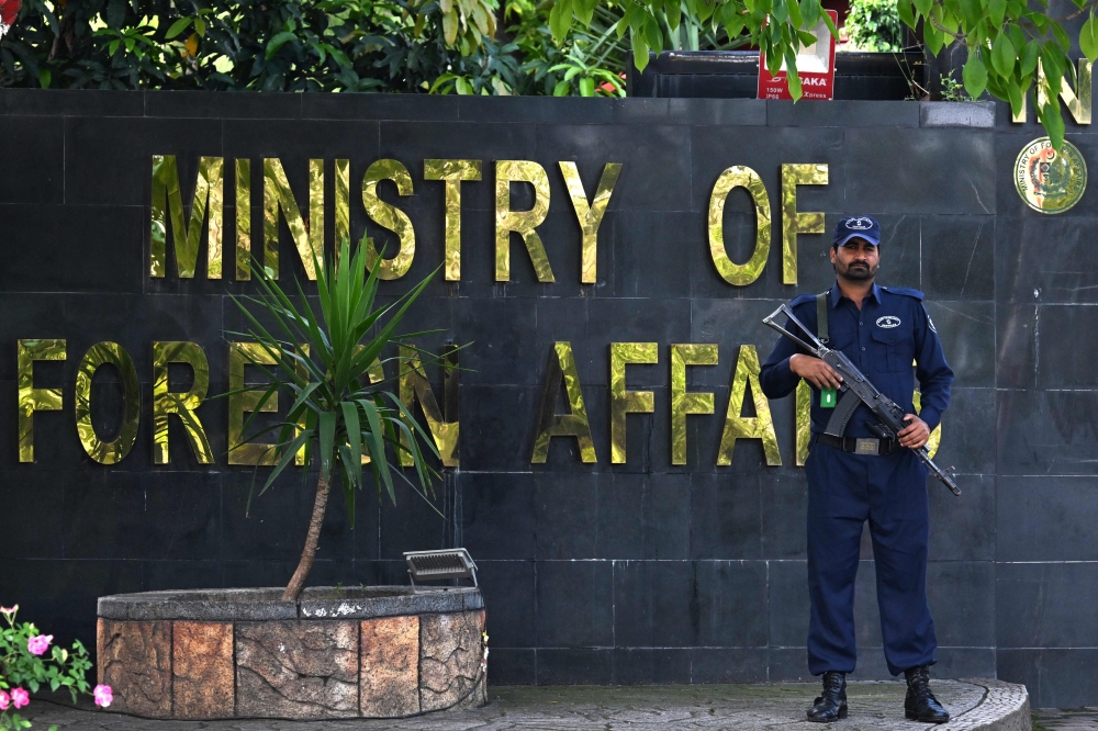 A security personnel stands guard outside the Foreign Ministry office in Islamabad on April 9, 2026.