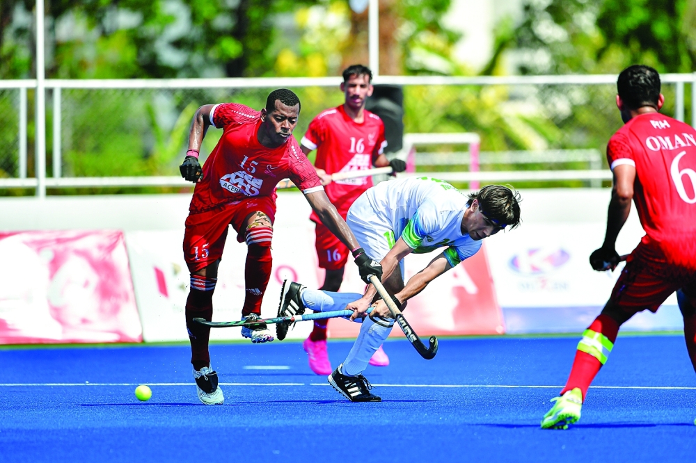 Oman and Uzbekistan players in action during the semifinal of the Asian Games Qualifier in Bangkok.