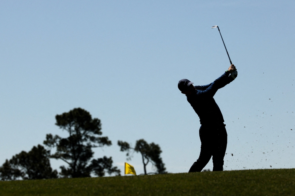Northern Ireland's Rory McIlroy hits his tee shot on the 4th hole during the first round 