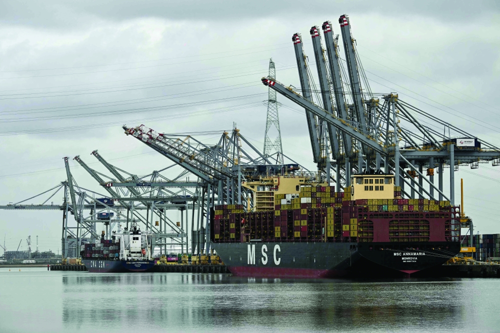 An MSC-operated container ship is docked in a harbour basin in Europe's second-largest port of Antwerp, northern Belgium, where shipping is largely halted following an oil spill at one of its docks. — AFP