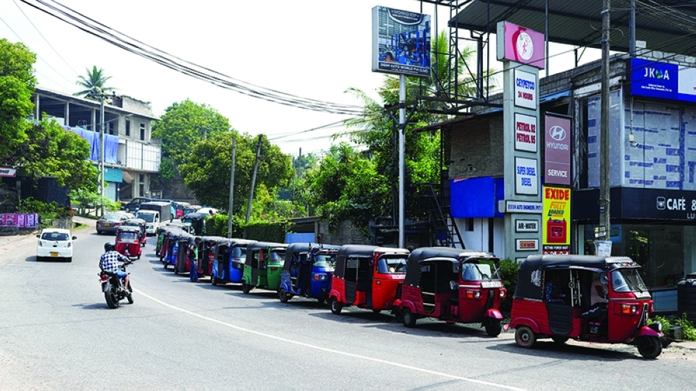 Vehicles queue at a fuel station, as concerns grow over fuel supply following US-Israel conflict with Iran, in Ratnapura, Sri Lanka. — Reuters