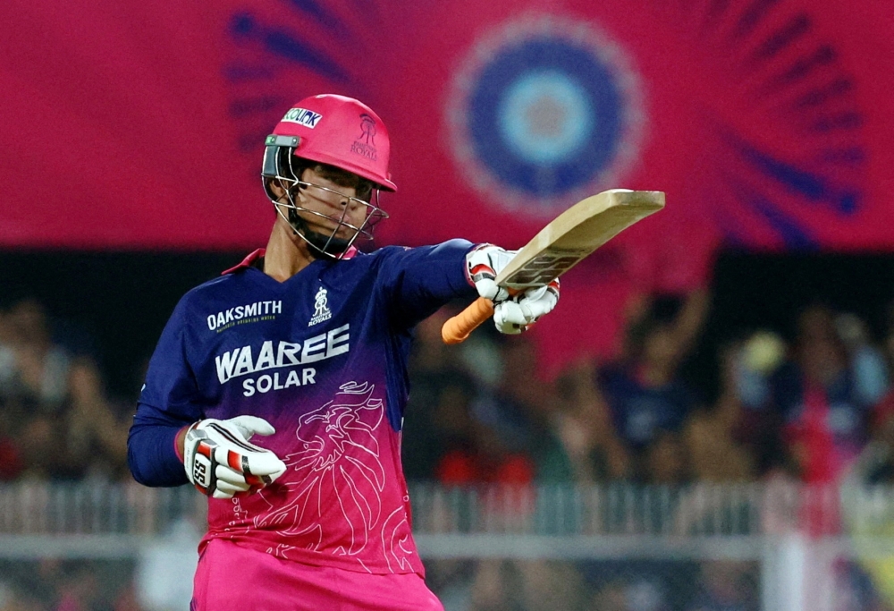 Rajasthan Royals' Vaibhav Suryavanshi celebrates after reaching his half century 