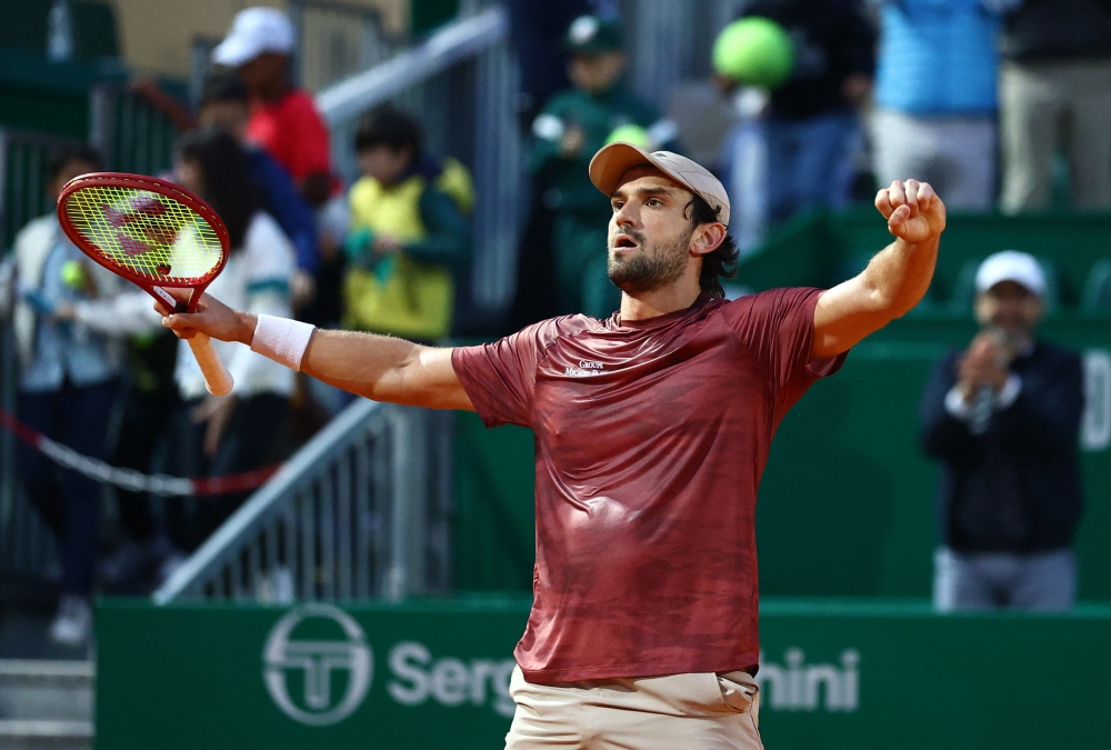  Monaco's Valentin Vacherot celebrates winning his quarter final match against Australia's Alex de Minaur 