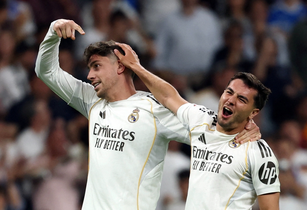  Real Madrid's Federico Valverde celebrates scoring their first goal with Brahim Diaz