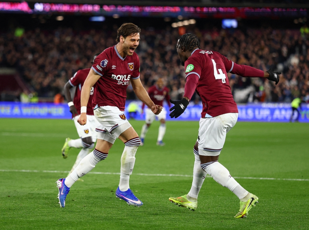  West Ham United's Konstantinos Mavropanos celebrates scoring their fourth goal with Axel Disasi 