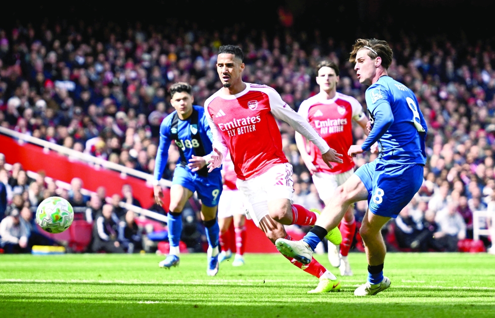 Bournemouth's Alex Scott scores their second goal. — Reuters