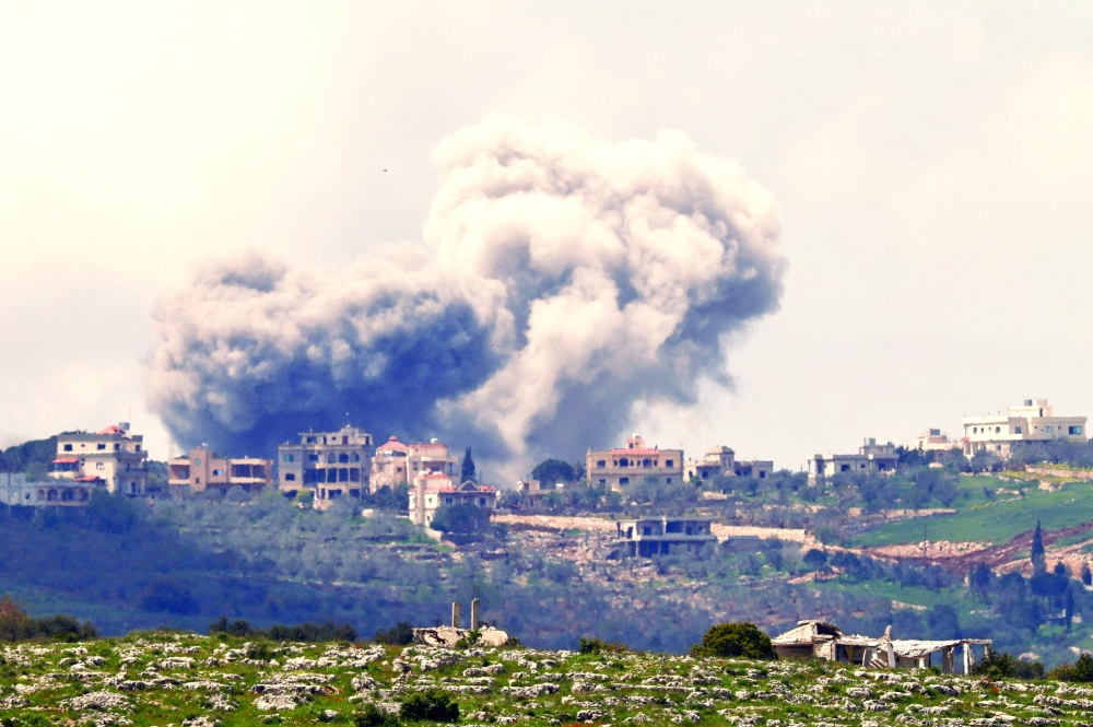 Smoke rises following an air strike in Lebanon. — Reuters