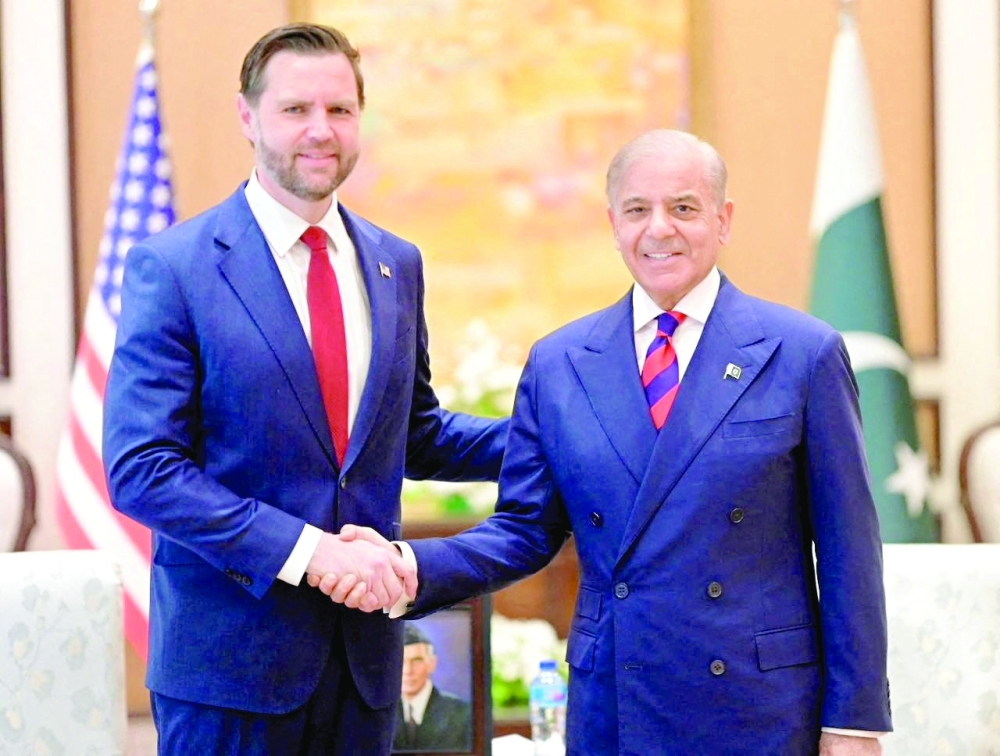 Pakistan's PM Shehbaz Sharif shakes hands with US Vice President JD Vance during their meeting, in Islamabad. — Reuters 
