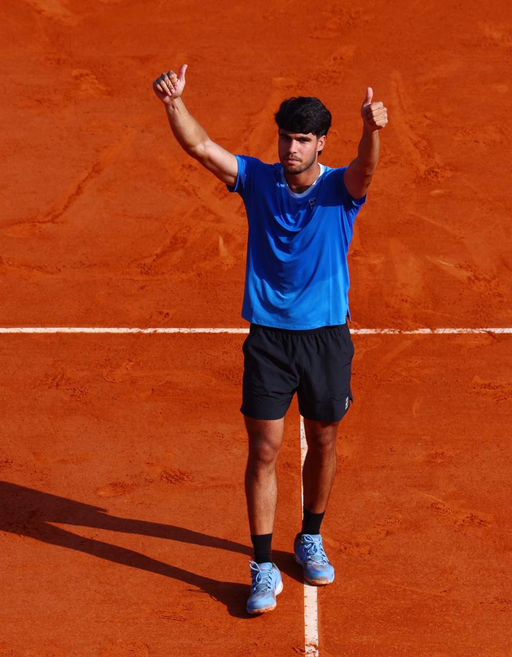  Spain's Carlos Alcaraz celebrates after winning his semi final match against Monaco's Valentin Vacherot  